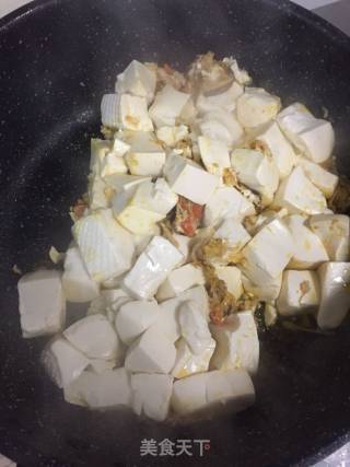 蟹黄豆腐的做法步骤：7