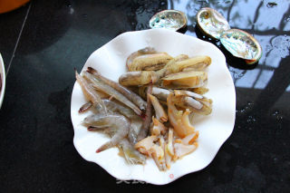 砂锅海鲜粥的做法步骤：7