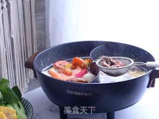 海鲜+牛肉鸳鸯火锅的做法步骤：12