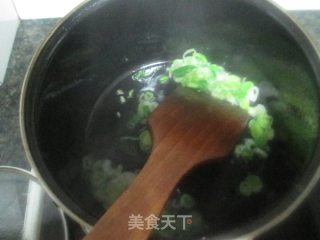 土豆酸菜焖饭的做法步骤：7