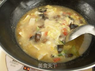 海鲜酸辣豆腐汤的做法步骤：16