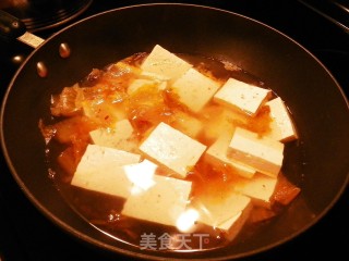 辣白菜味噌海鲜豆腐汤的做法步骤：4