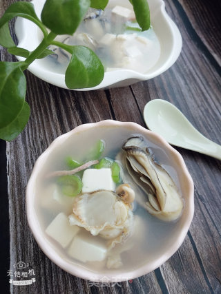 海鲜丝瓜豆腐汤的做法步骤：14