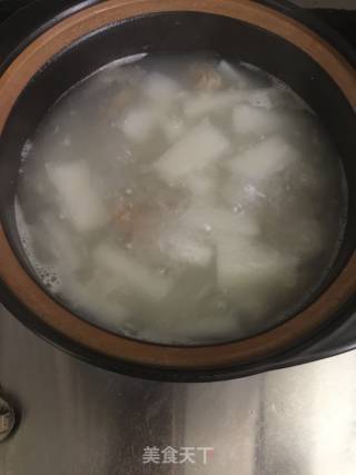 白萝卜煲排骨干贝的做法步骤：7
