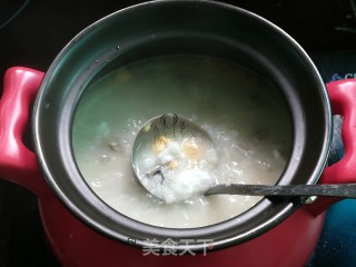 蚝豉鱿鱼咸蛋粥的做法步骤：10