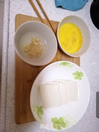 瑶柱豆腐蒸水蛋的做法步骤：1
