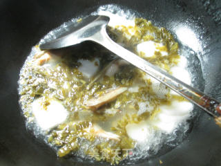 雪菜蛏子年糕汤的做法步骤：4