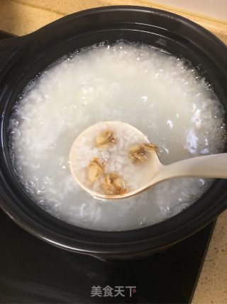 砂锅海鲜粥的做法步骤：9