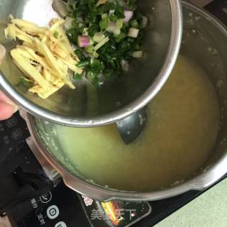 小米花蛤粥的做法步骤：5