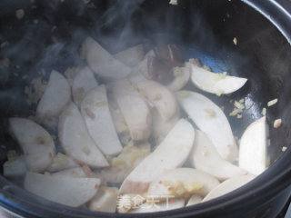 金蚝鲜味砂锅煲的做法步骤：7