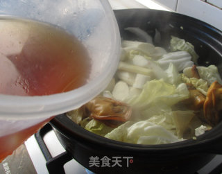 金蚝鲜味砂锅煲的做法步骤：11
