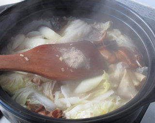 金蚝鲜味砂锅煲的做法步骤：13