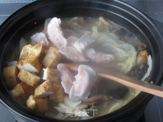 金蚝鲜味砂锅煲的做法步骤：15